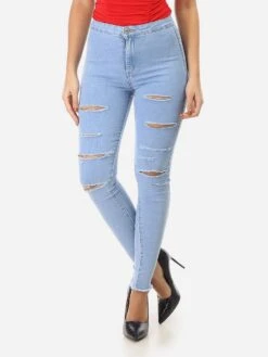 Jeans à Trous Et Effiloché